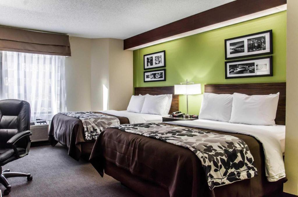 Sleep Airport - Billy Graham Parkway Hotel